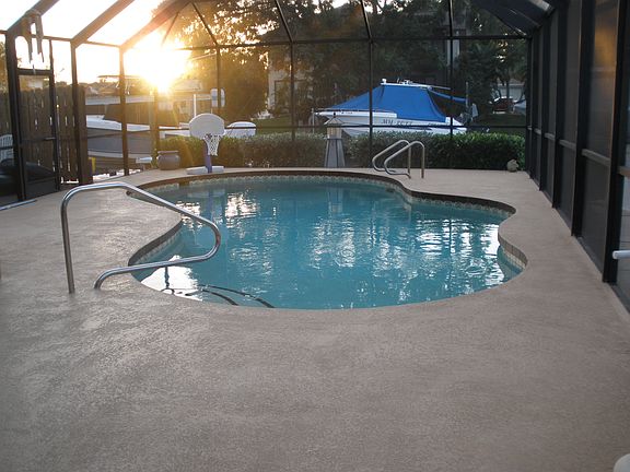 Pool with screen enclosure