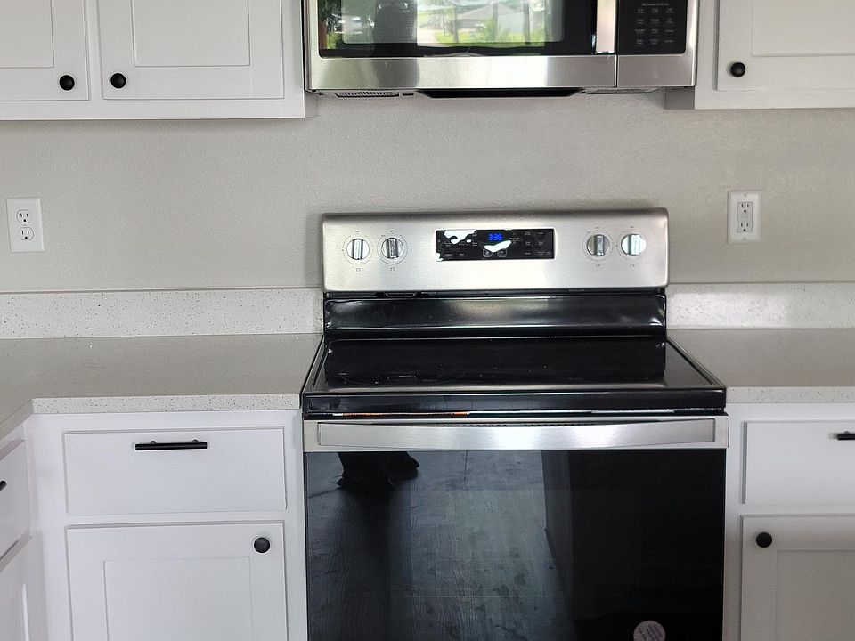 View of stainless-steel appliances in kitchen