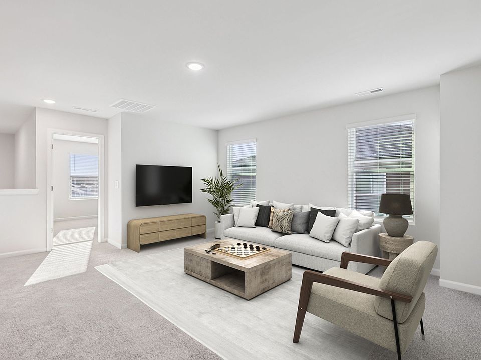Loft in the Johnson floorplan at a Meritage Homes community in Garner, NC.