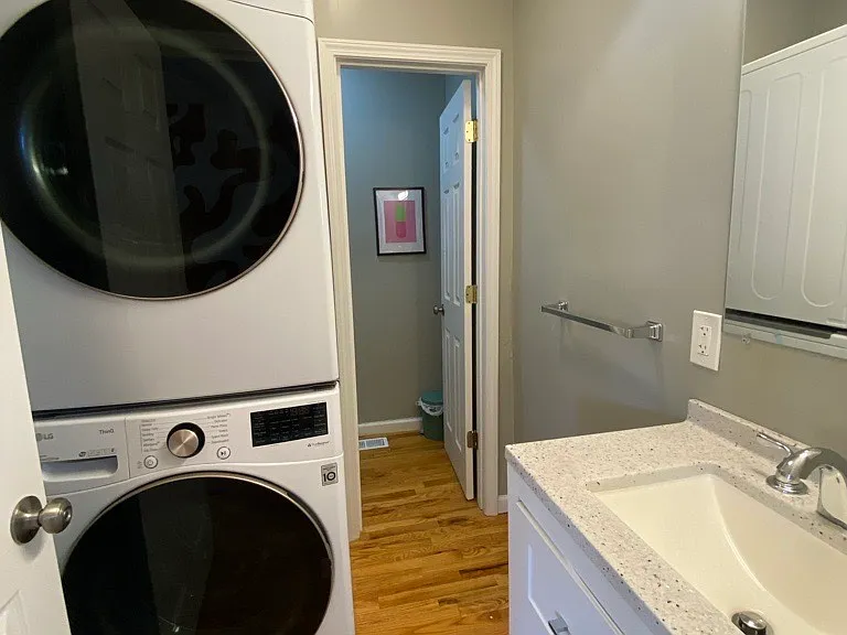 first level bathroom with laundry facilities