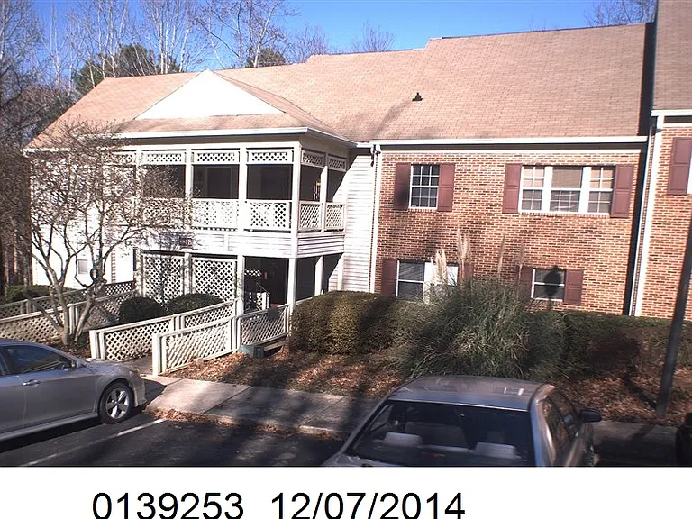 Exterior with parking at your door- second story entrance