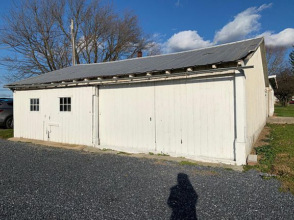 3-4 car garage/storage (new doors coming in the Spring)