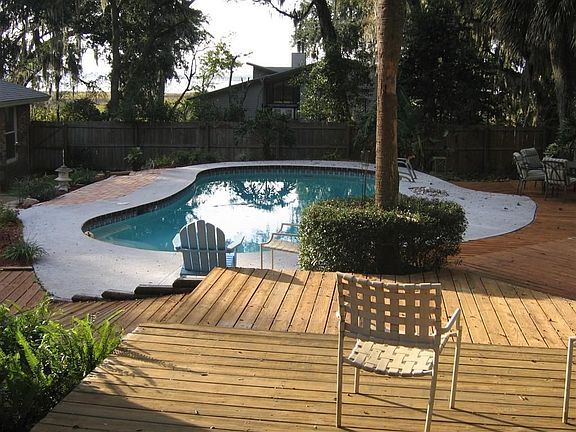 Backyard (pool and river views)