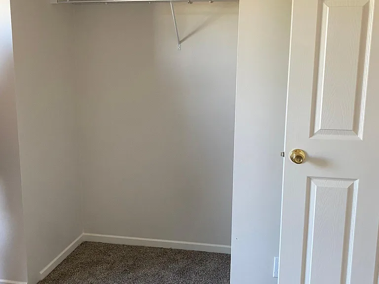 Closet bedroom 2, white doors not pictured
