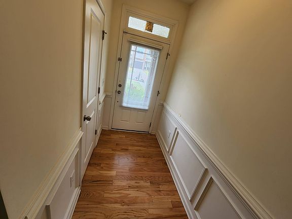 Entry Foyer. Door on the left is powder room.