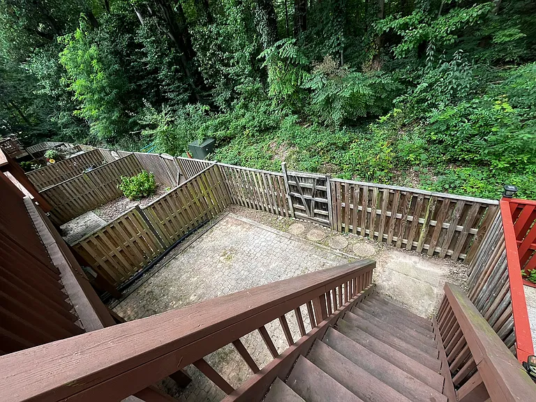 Large patio with fenced in backyard accessible through walk out basement or from the deck
