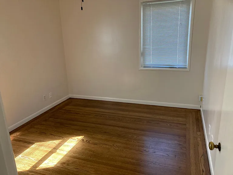back bedroom 10' 2". x 12'