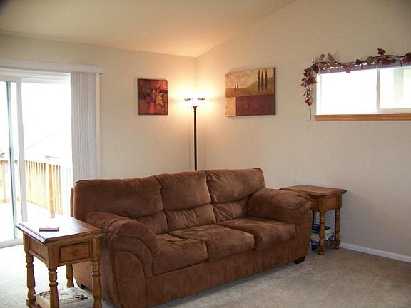 View of living room toward deck