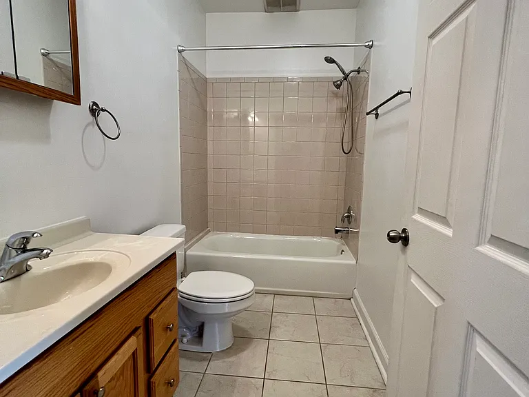 2nd bathroom with lots of storage including above the sink