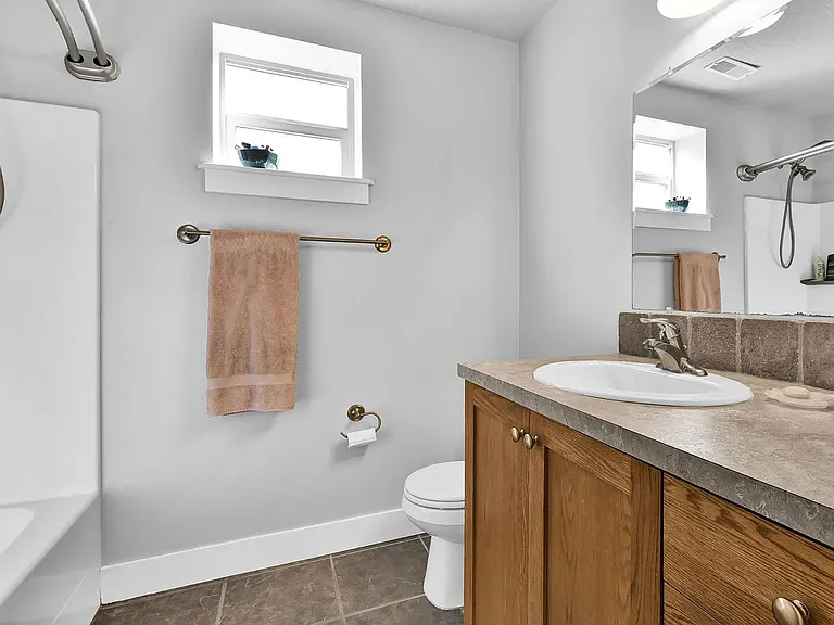 2nd full bathroom downstairs, as a part of the Master suite.