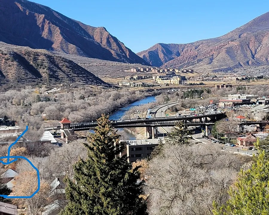 Home is circled in blue. One-half block from downtown, cut through the parking lot across the alley and you are there.