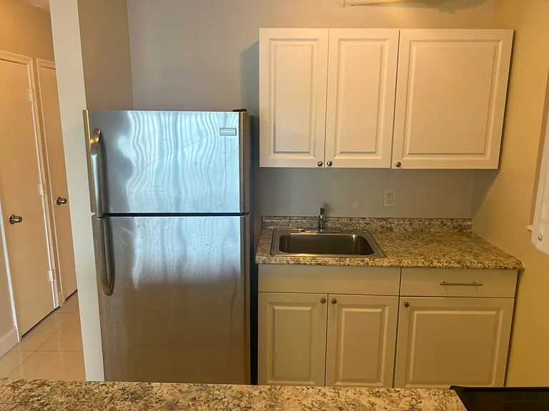 300 NE 191st St #206 — Photo 4