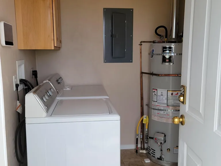 Laundry with small closet (closet not shown).