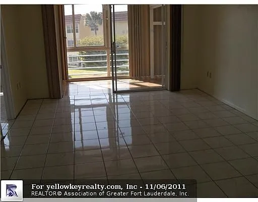 Building Photo - 3050 E Sunrise Lakes Dr