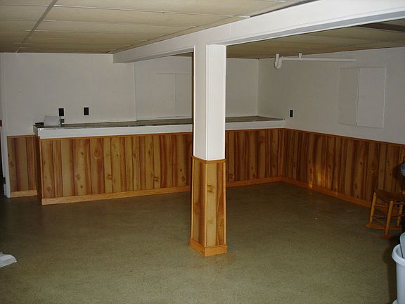 Giant Basement that is finished with an additional workshop.