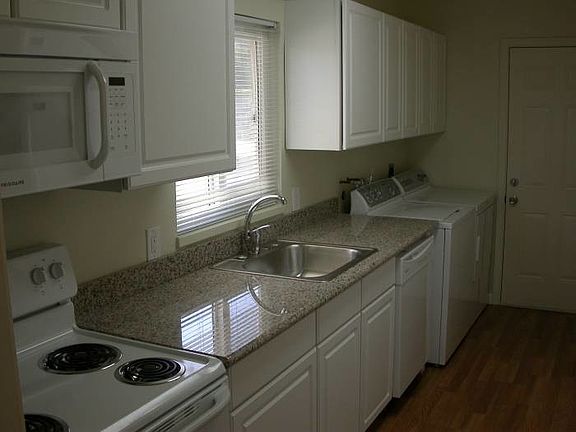 Kitchen with refrigerator