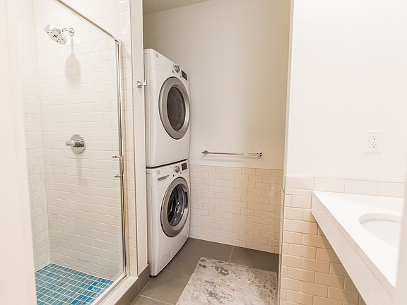 Laundry and 2nd bath; tiled shower stall