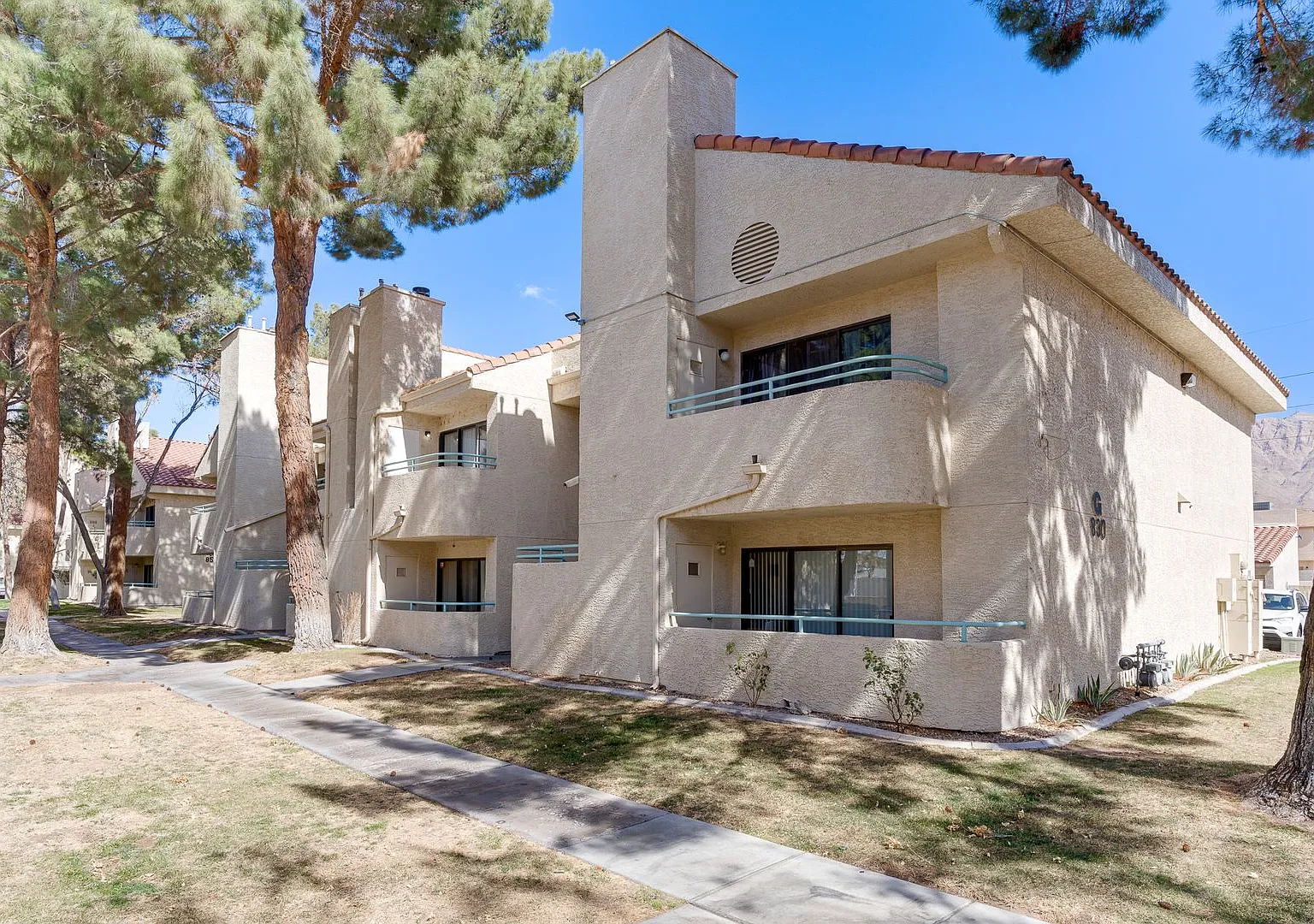 Charming Upstairs Condo with Dual Balconies & Spacious Layout! — Photo 3