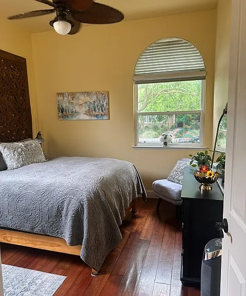 Bedroom #2 with walk-in closet, dresser and mirror