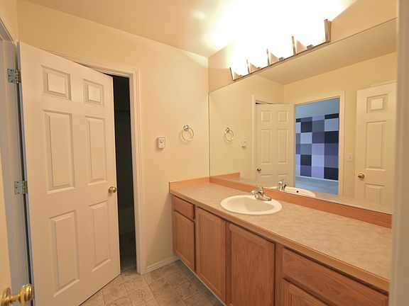 Main bathroom has separate toilet, shower area for added pri