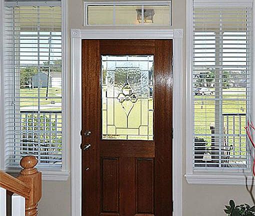 Leaded Glass front door. Wood planked flooring throughout.