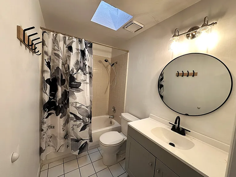 Newly Updated Main Floor Bathroom with Skylight