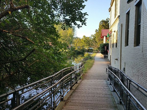 next to towpath, canal & river