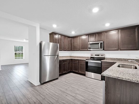 Incredible entertainment space and plenty of natural light are just a few highlights of this home