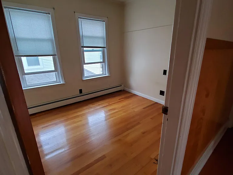Office off hallway across from dining room, no closet in this room