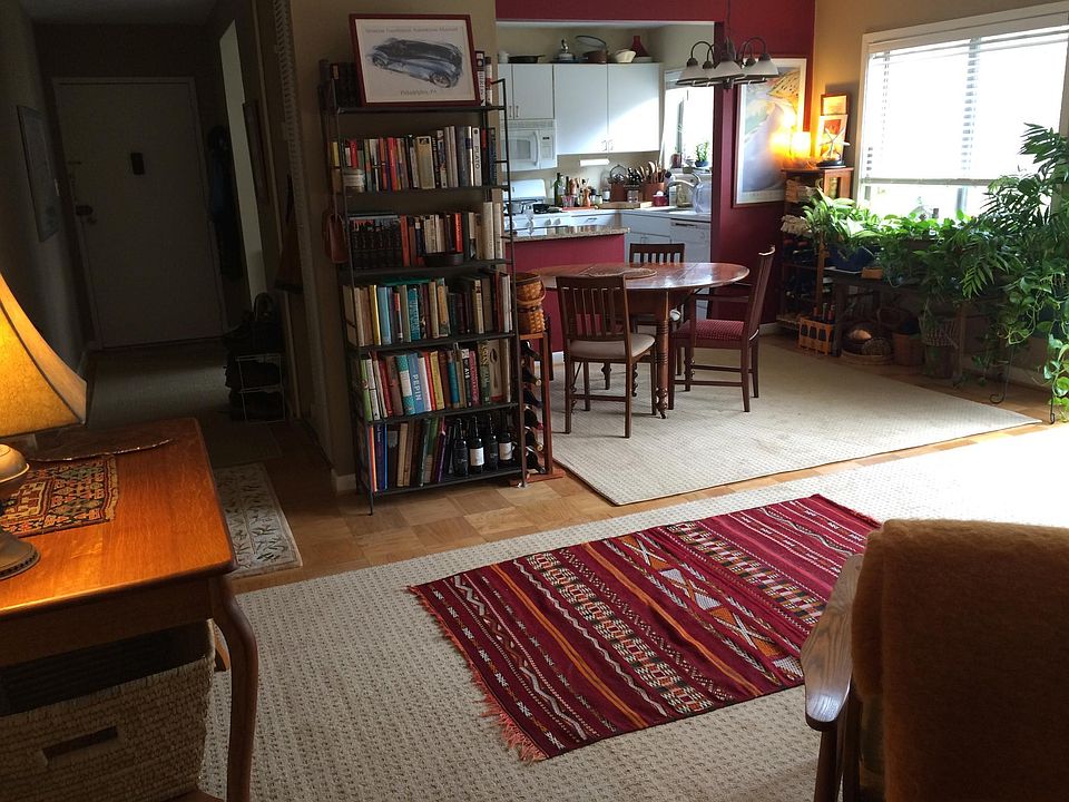 Living room; hardwood floors, large area rugs included