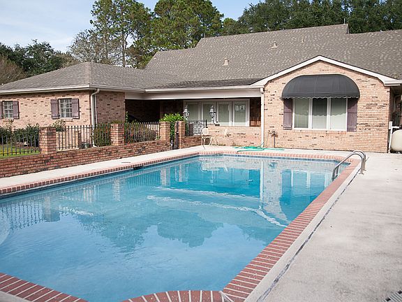 Pool w/ rear of house