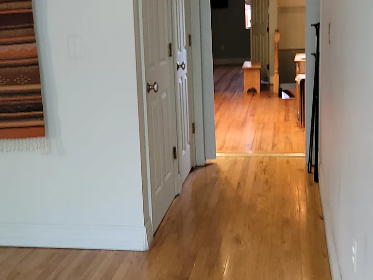 Master en-suite walk out, bathroom on left, small closet to sitting room