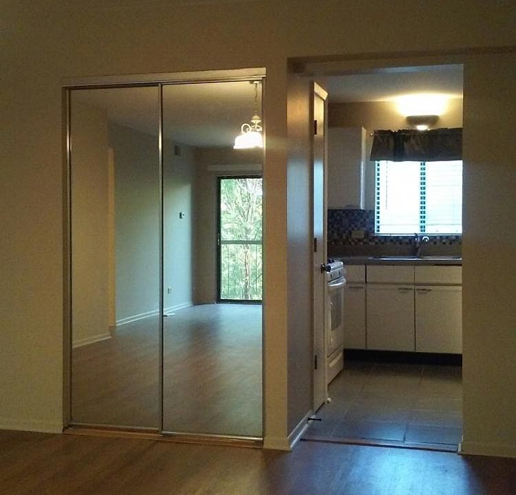Facing kitchen from living room
