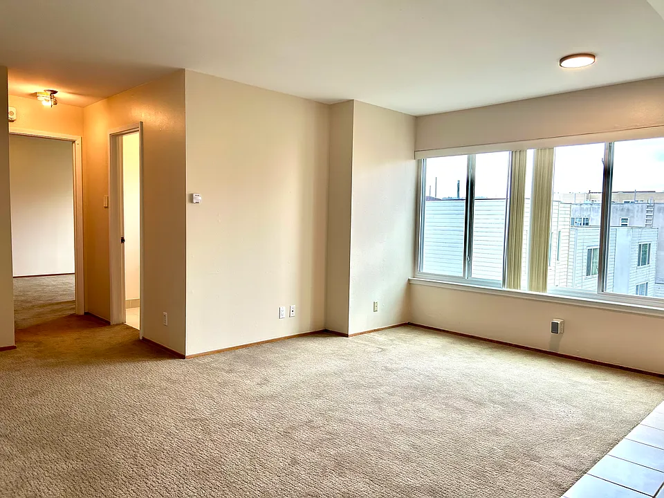 living room. left bathroom entry. left bedroom entry.