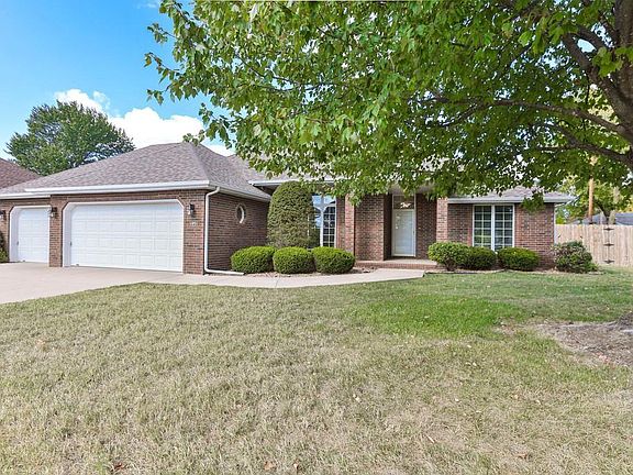 3 car garage; all brick house.