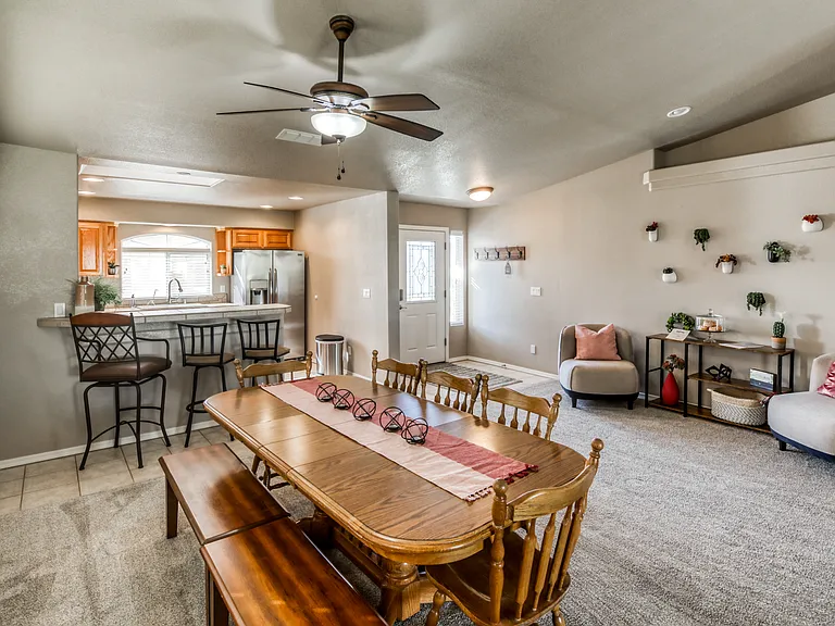 Kitchen Table, Entryway, Barstools at counter, Pantry to the left of Barstools (not pictured)