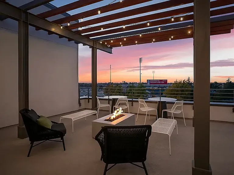 Experience urban elegance with this chic rooftop lounge, perfect for sunset gatherings at 805 Riverfront in Sacramento