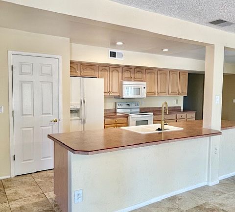 4th image of 11801 N Coggins Dr