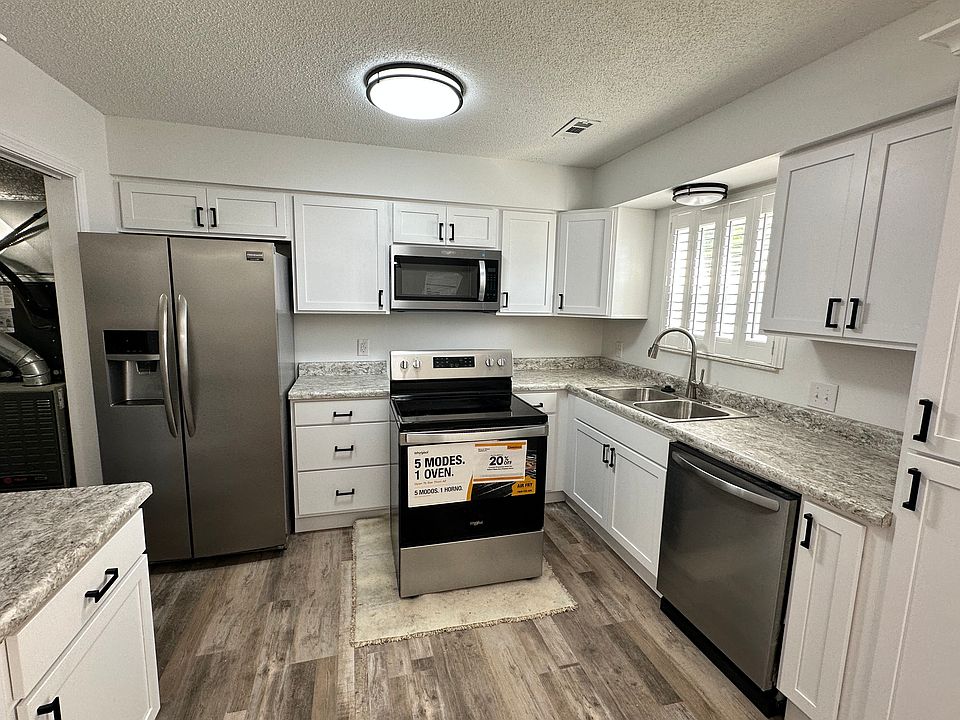 Kitchen with pantry and main floor laundry