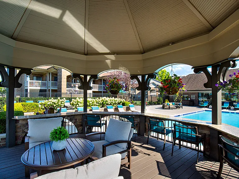 Poolside gazebo with lounge seating