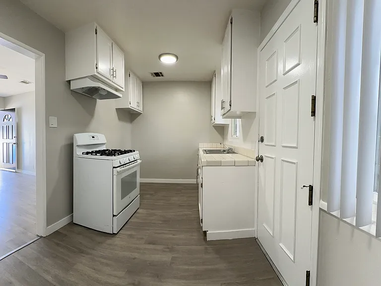 Kitchen with ample cabinetry for storage
