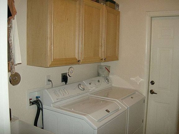 Laundry Room with sink & Maple Cabinets