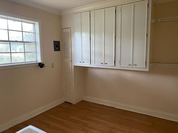 Laundry Room with Ample Cabinets