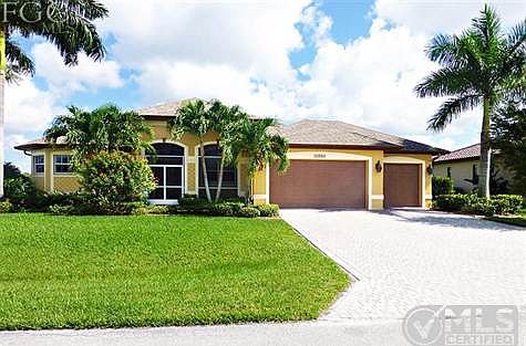 Custom built with exciting details, starting with the over sized 3-car garage. More than enough room for your golf cart and 2 vehicles.