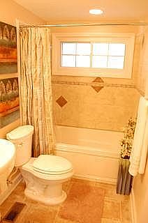 Bath with soaking tub