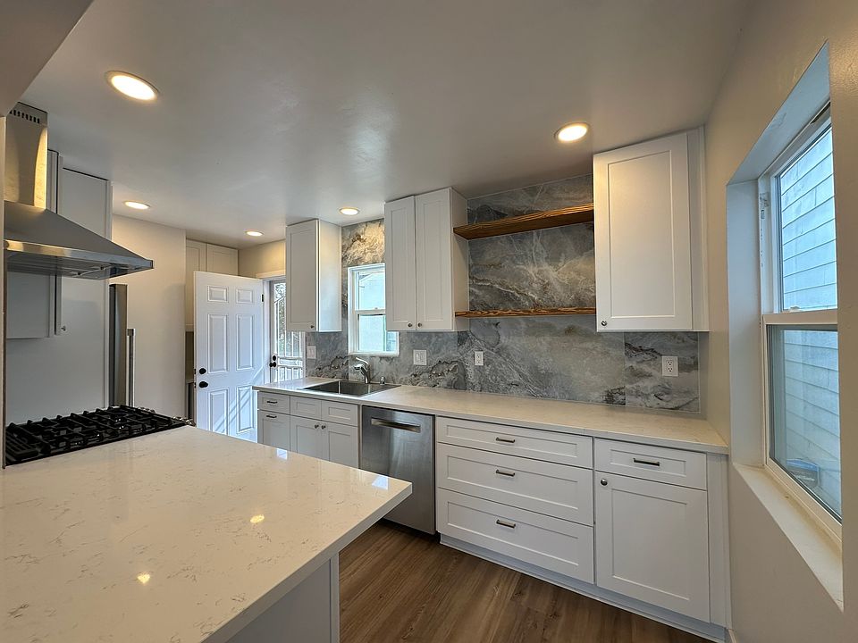 Gorgeous kitchen with top of the line appliances and seamlessly connects to the living room.