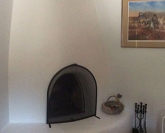 Kiva fireplace in Master bed