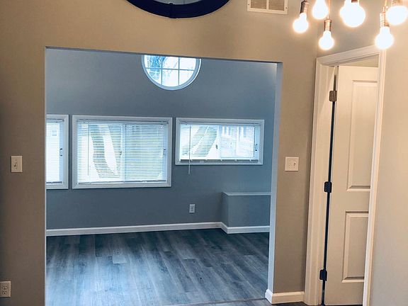 Kitchen opens to the living room with pantry/storage