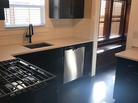 Kitchen - new cupboards, sink, appliances: gas stove, fridge, dish washer