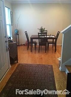 Front Entry & Dining Room
						:
						Entry w/ Tiffany Light Fix,2nd fl wood stairs,DR opens to kit,1/2 bath, laundry